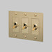 Buster + Punch 3-Gang Toggle Switch – Linear - Brass / With Logo - 3G Toggle