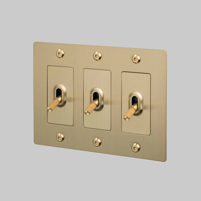 Buster + Punch 3-Gang Toggle Switch – Linear - Brass / Without Logo - 3G Toggle