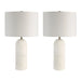Two table lamps with white cylindrical bases and white lampshades on a white background