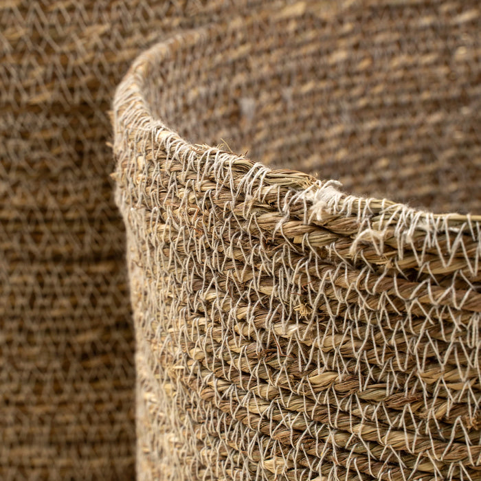 Close-up of the Costa basket’s rounded rim and woven seagrass texture with fine white stitching