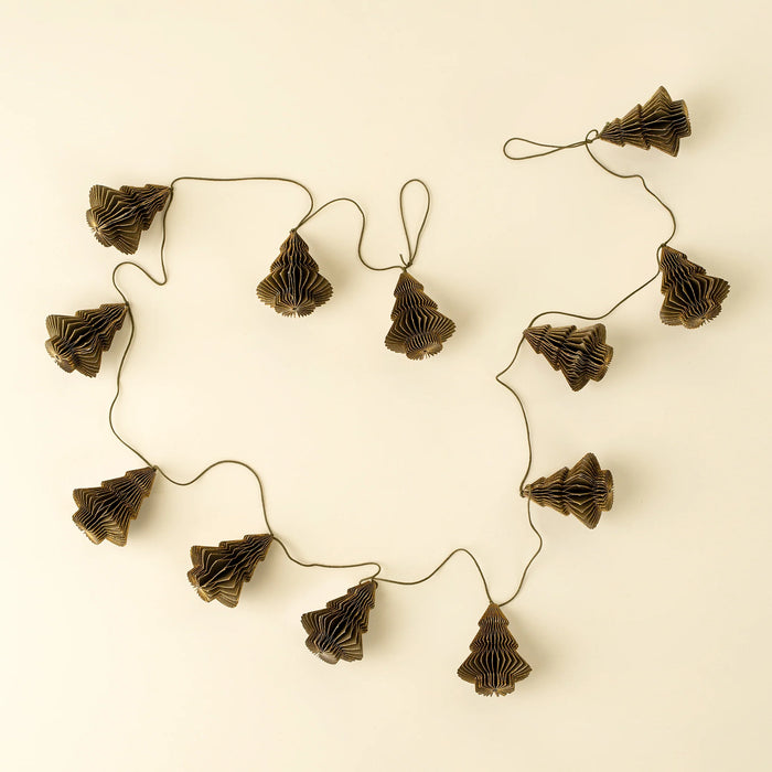 Indaba holiday garland with folded antique green paper trees spaced along a cord on a cream background