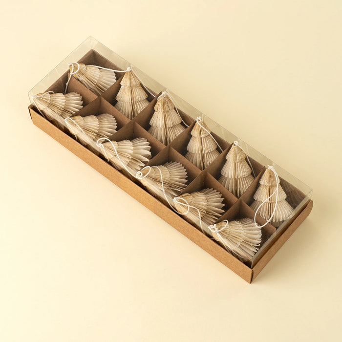 Ivory paper tree holiday garland packed neatly inside a long rectangular gift box