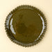 Top view of an Indaba Merida green stoneware dinner plate with a glossy glaze and hobnail rim