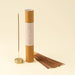 Velvet Dusk incense gift set with a cylindrical tube, bundled sticks, and one stick upright in the holder