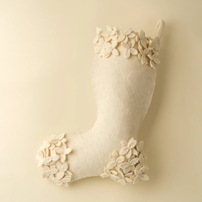 Cream Winter Bloom Christmas stocking with raised felt flowers around the cuff, heel and toe