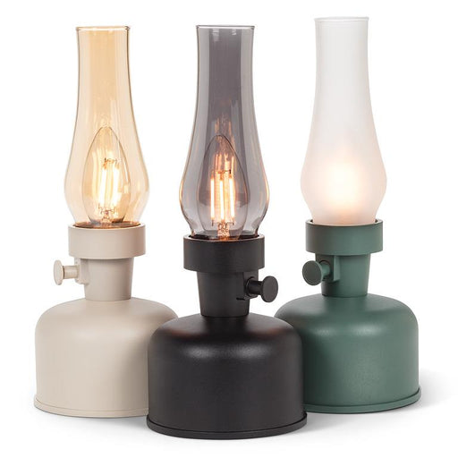 Lantern LED lamps in black, cream, and green finishes with smoke glass chimneys