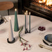Uyuni LED cone candles styled with decorative objects for modern home decor